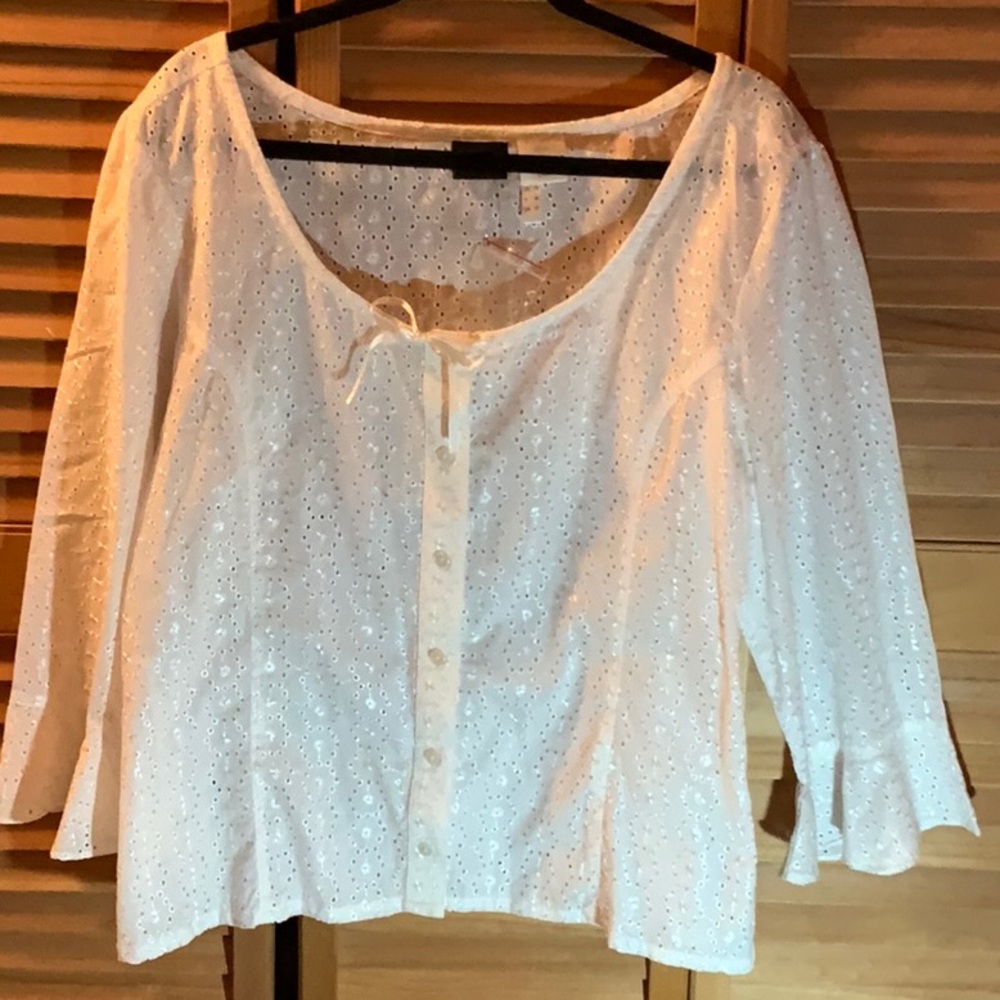 White button-up eyelet cotton blouse.